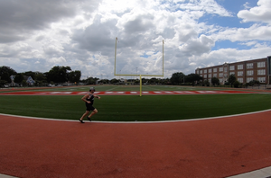 Mann running on track
