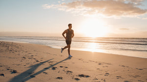 man running on beach