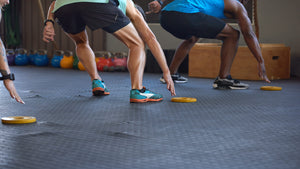 people doing cardio speed exercises in a gym
