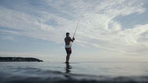 man fishing to reduce stress