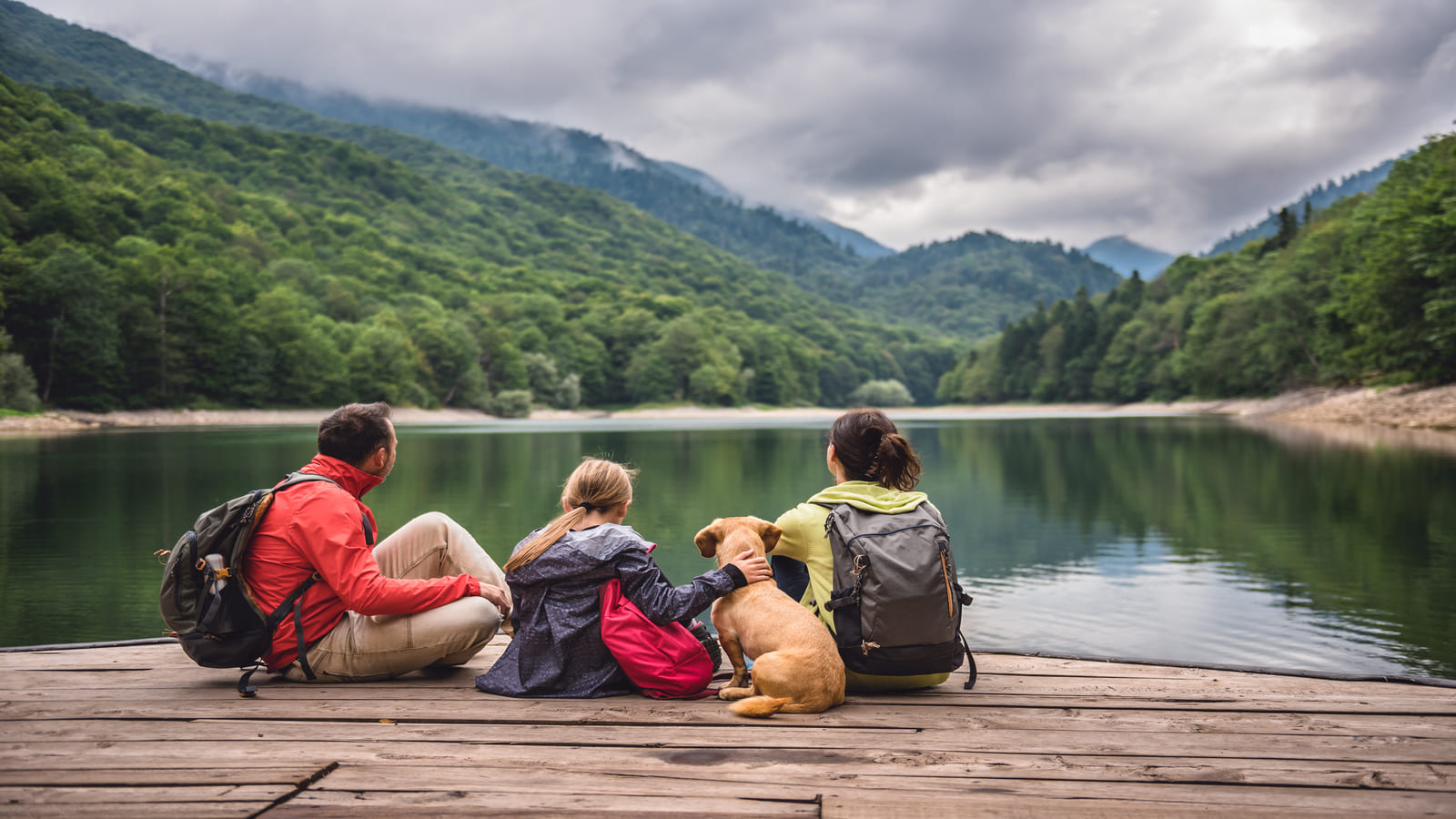 family on vacation at lake