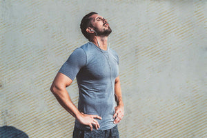 man holding vitamin b12 supplement