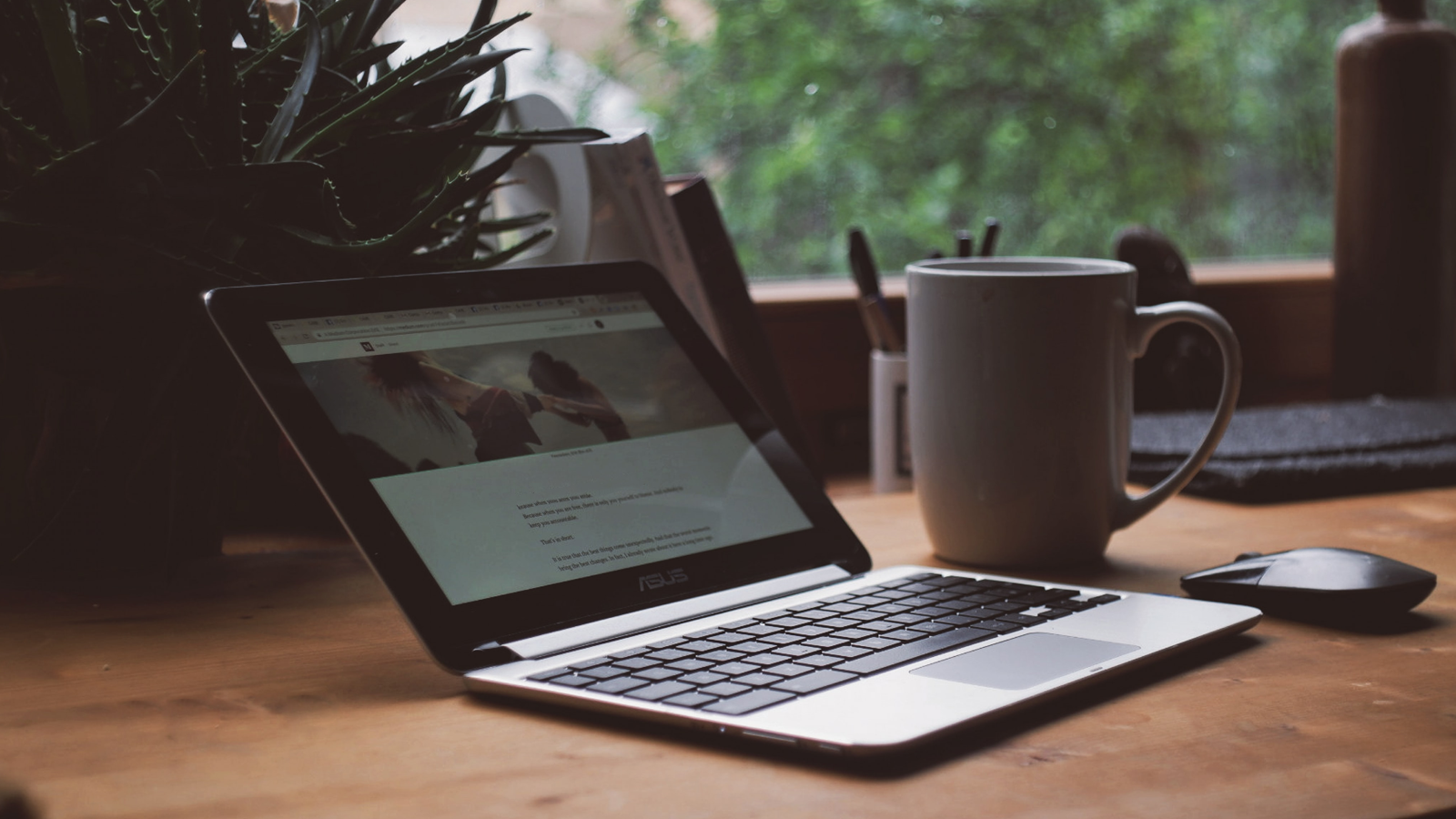 Working From Home desk with laptop and coffee